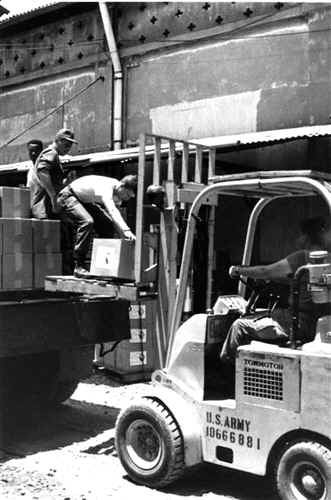 ForkLoadingleaflets.jpg (135341 bytes)