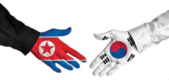 NKSKHandshake.JPG (33430 bytes)